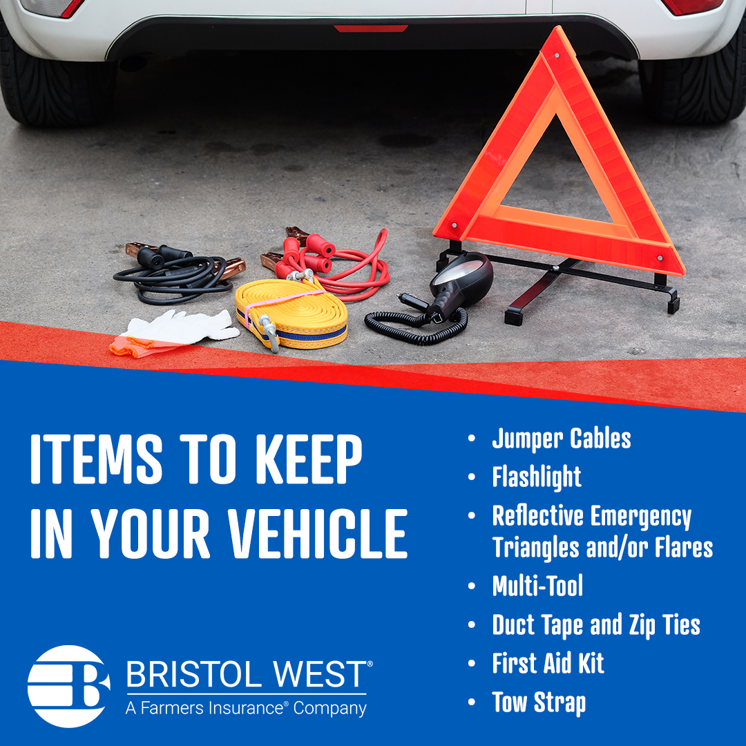 Safety items on the ground next to car