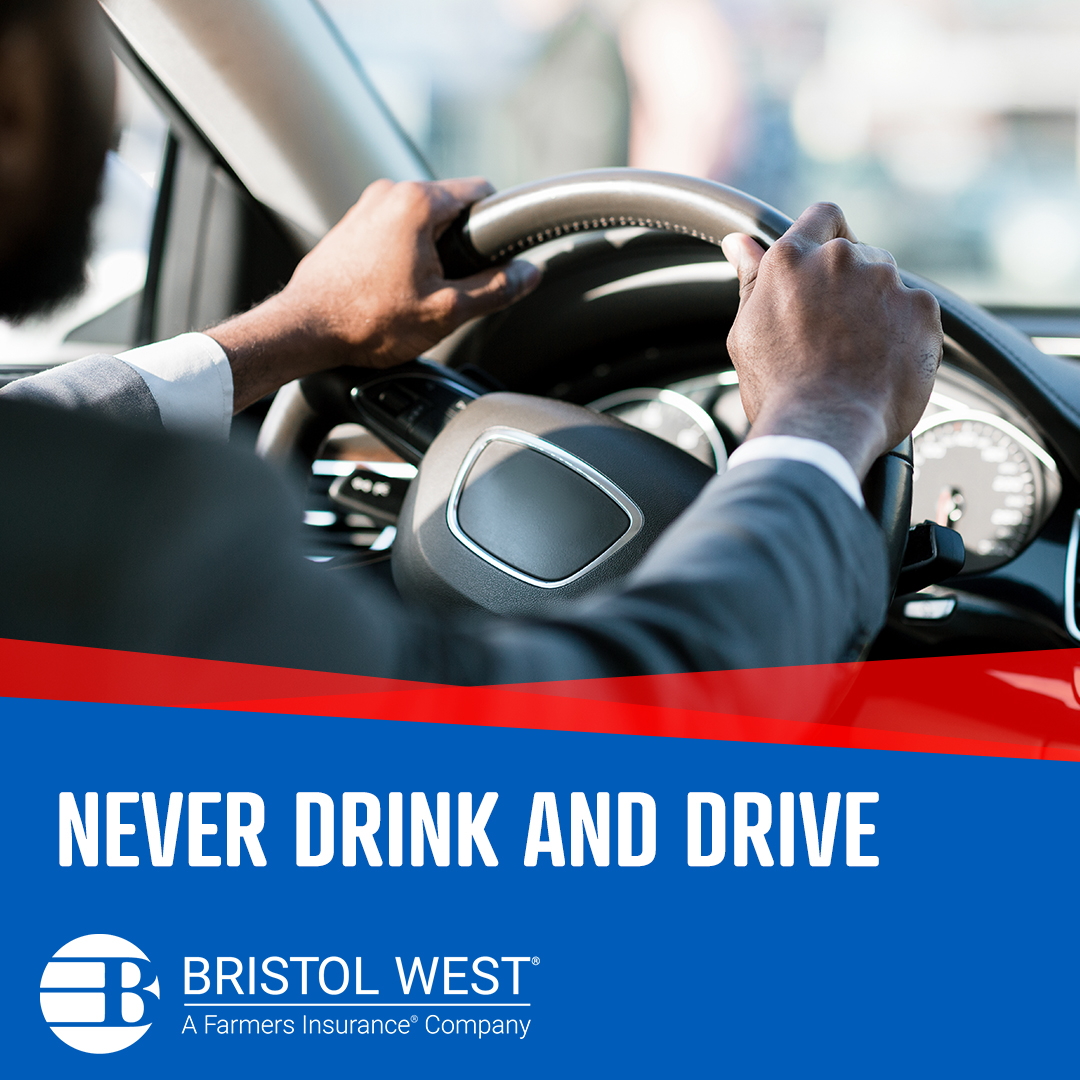 Person with two hands on the wheel driving