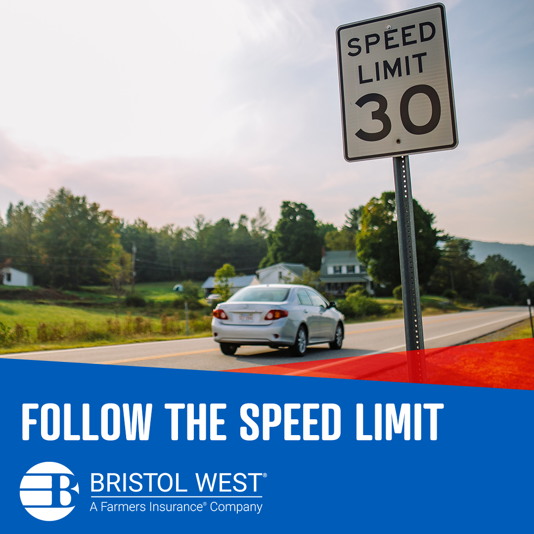 30 MPH speed limit sign with vehicle driving in background 